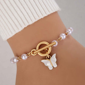 Shop elegant Tocona Butterfly Gold Bracelets. Perfect for fashion-forward women. Zinc alloy, pearl stone accessories. Ideal gift!